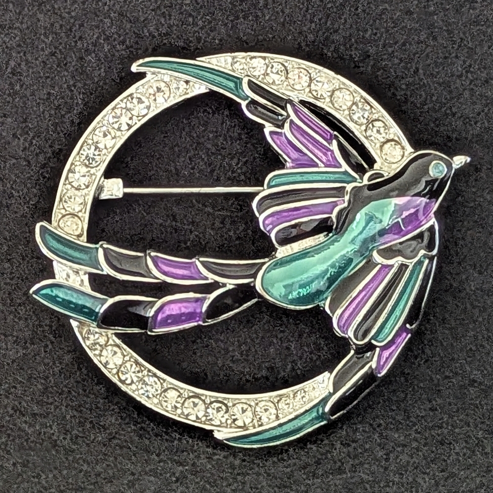 ANNE KLEIN. BIRD IN FLIGHT WITH CRYSTALS.